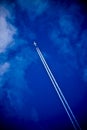 Aircraft and vapour trail Royalty Free Stock Photo
