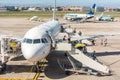 Aircraft of the Vueling airlines stopped at the apron of Naples international airport Capodichino, Italy