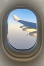 Aircraft window with blue sky on background Royalty Free Stock Photo