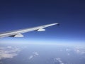 Aircraft Wing above Clouds