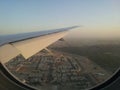 Aircraft wing. View from aircraft window landing in Dubai Royalty Free Stock Photo