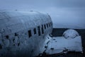 Aircraft wreckage of the DC3 in Solheimasandur in the black volcanic sand on Iceland.