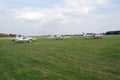 Aircrafts on a grass airfield