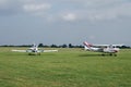 Aircrafts on a grass airfield