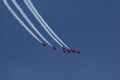 Aircrafts. Red Arrows flying in formation in England Royalty Free Stock Photo