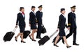 Aircrew with travel bags walking isolated on white background