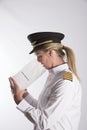 Airline officer using an air sickness bag