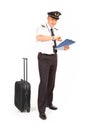Airline pilot checking time Royalty Free Stock Photo