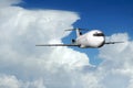 Airliner coming out of clouds Royalty Free Stock Photo