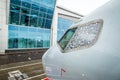 Airliner near airport terminal. Aircraft at heavy snow. Plane in snow at airport. Bad weather, snow blizzard at airport Royalty Free Stock Photo