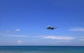 Airliner or Passenger plane VietJet Air Airbus A320 landing to airport next to the beach. Royalty Free Stock Photo