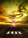 airliner plane take off from airport runway against beautiful sun rising sky