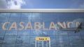 CASABLANCA city name and landing airplane at airport terminal. 3d rendering