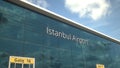 Airliner take off reflecting in the windows with Istanbul Airport text, 3d rendering