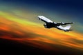 Airliner taking off at sunset Royalty Free Stock Photo