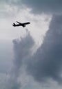 Airliner Flying Through Threatening Clouds