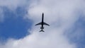 Airliner under a cloud Royalty Free Stock Photo