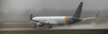 Airplan speeding on a wet runway