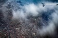 Airplane above city Royalty Free Stock Photo