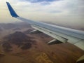 Airplane above the desert Sinay Royalty Free Stock Photo