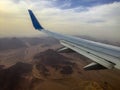 Airplane above the desert Sinay Royalty Free Stock Photo