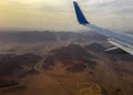 Airplane above the desert Sinay Royalty Free Stock Photo