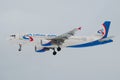 Airplane Airbus A320 VQ-BCZ of the airline `Ural airlines` close-up in the gloomy sky