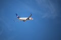 Airplane of the airline Travel Service (Czech Republik) against blue sky