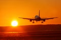 Airplane airport aviation sun sunset vacation holidays travel tr Royalty Free Stock Photo