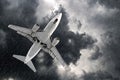 Airplane approach at the airport landing in bad weather storm hurricane rain