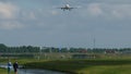 Airplane approaching to airport Royalty Free Stock Photo