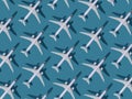 Airplane background. Flights, travel and aviation. Pattern of white planes on a blue background. The passenger plane is Royalty Free Stock Photo