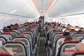 Airplane cabin aisle with rear view and seatsstock, photo, photograph, image, picture Royalty Free Stock Photo