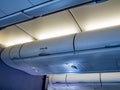 Airplane cabin with overhead compartment