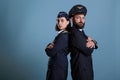 Airplane captain and flight attendant in airline uniform