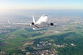 Airplane is climb flight level high view in the air, against the background sky horizon the airport of the runway, city, fields, f