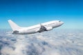 The airplane climbs hight flight cloud sky. Royalty Free Stock Photo