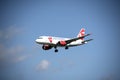 Airplane in the cloudy sky Royalty Free Stock Photo