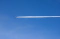 Airplane condensation trail Royalty Free Stock Photo