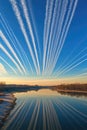 airplane contrails creating patterns in a clear sky