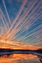 airplane contrails creating patterns in the sky