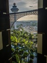 Airplane and control tower from a hotel Royalty Free Stock Photo