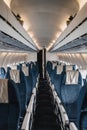 An airplane corridor and seats Royalty Free Stock Photo