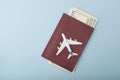 Airplane on the cover of the passport. Dollars. Travel concept. Royalty Free Stock Photo