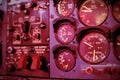 Airplane dashboard. Control clocks in red tone