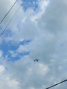 an airplane dispels the emptiness of the sky Royalty Free Stock Photo