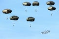 Airplane dropping para troopers at memorial day airborne