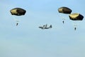 Airplane dropping para troopers at memorial day airborne