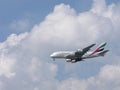 Airplane of Emirates Airline in the sky