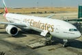 Airplane of Emirates airlines at the boarding gate of Queen Alia International Airport QAIA in amman Jordan